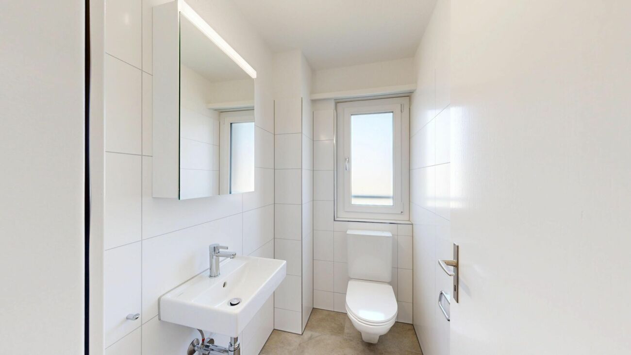 Gäste-WC mit Waschtisch und WC