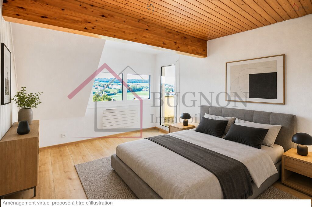 Helles Schlafzimmer mit Holzbalkendecke