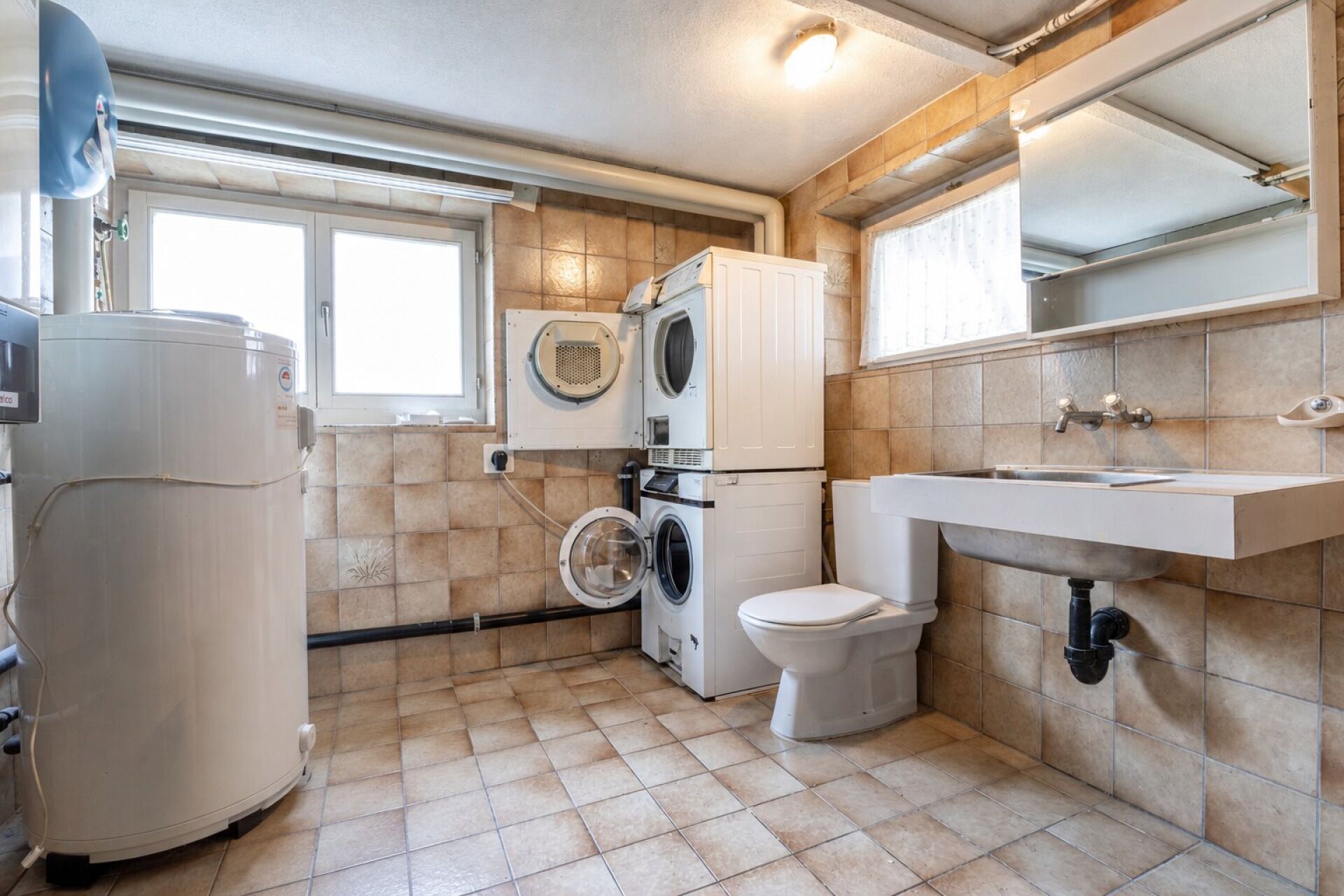 Hauswirtschaftsraum mit WC