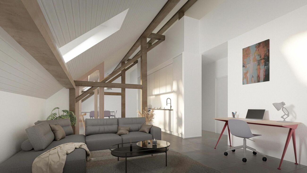 Heller Dachgeschoss-Wohnraum mit Homeoffice-Ecke