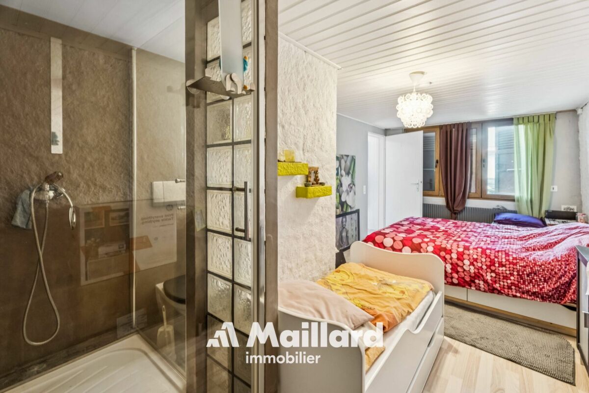 Schlafzimmer mit angrenzender Dusche