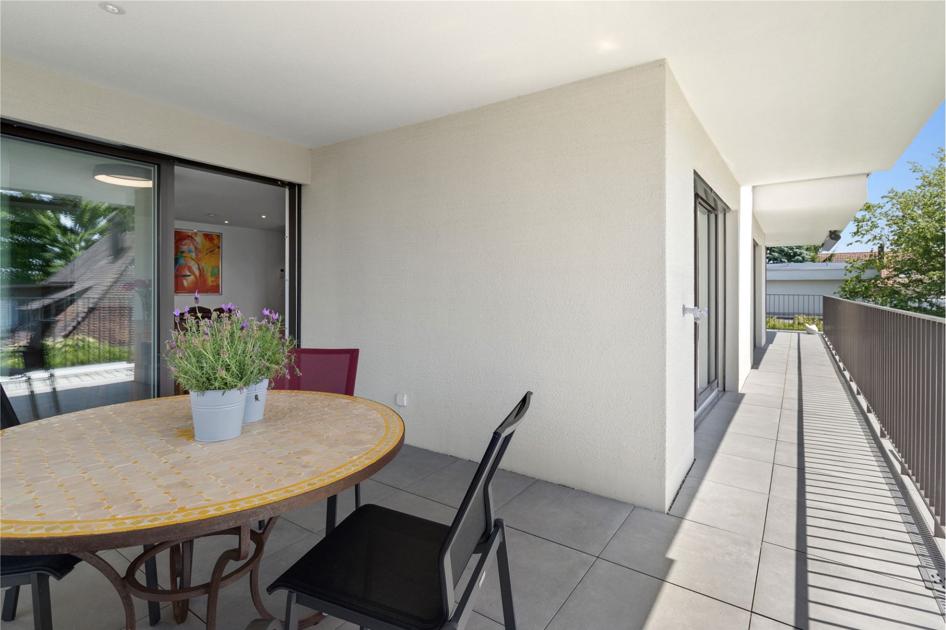 Überdachte Terrasse mit Sitzgruppe