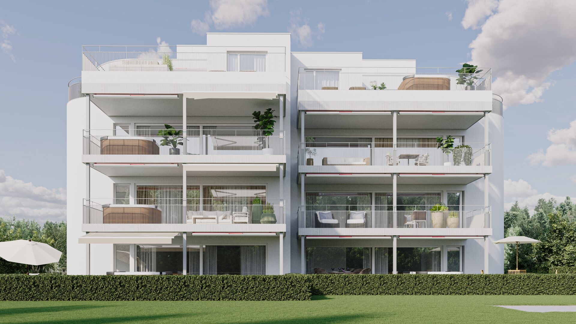 Modernes Mehrfamilienhaus mit großen Balkonen