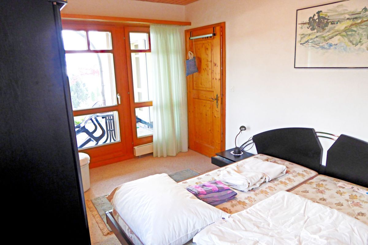 Schlafzimmer mit Balkonzugang