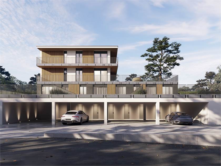 Moderne Wohnanlage mit Tiefgarage und Balkonen