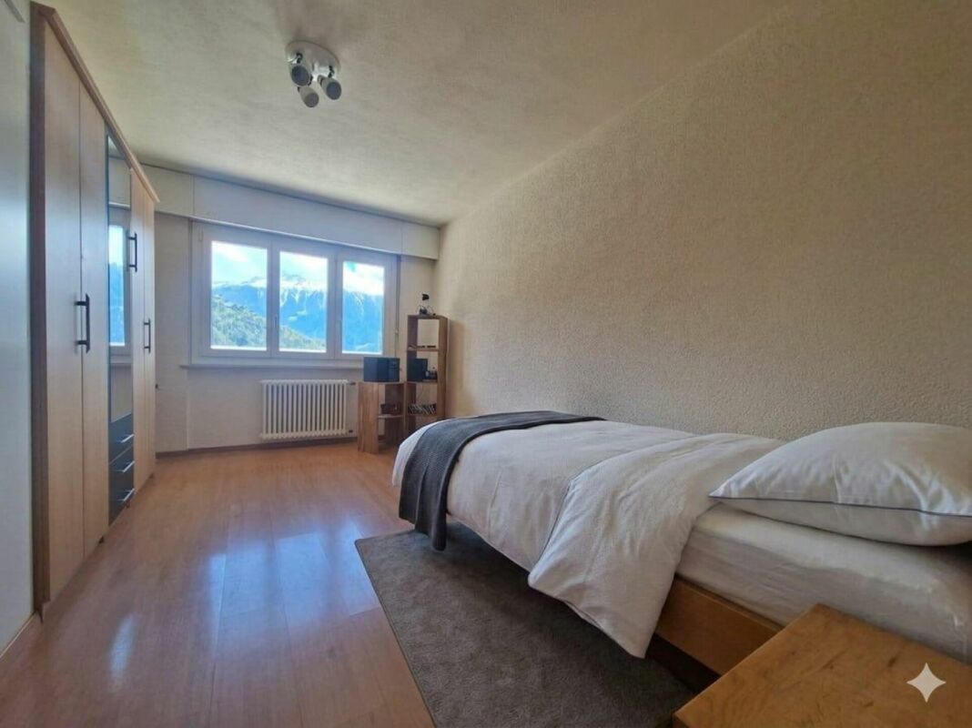 Schlafzimmer mit Bergblick