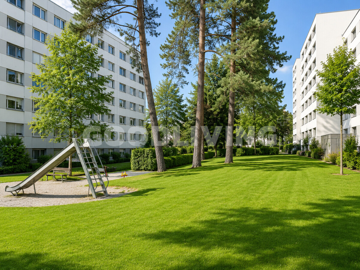 Wohnanlage mit Grünfläche und Spielplatz