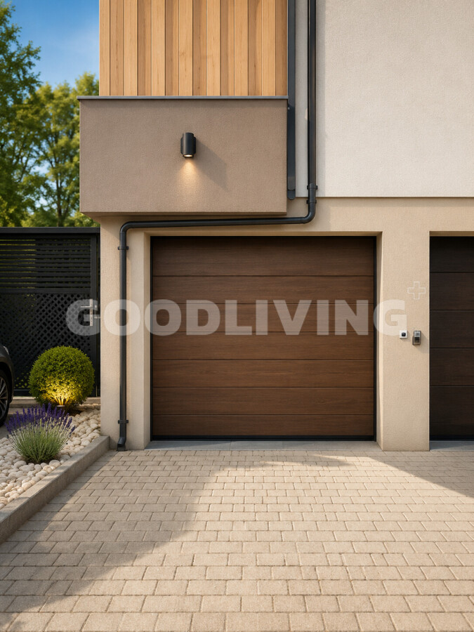 Moderne Einfahrt mit Garagen und Fassadendetail