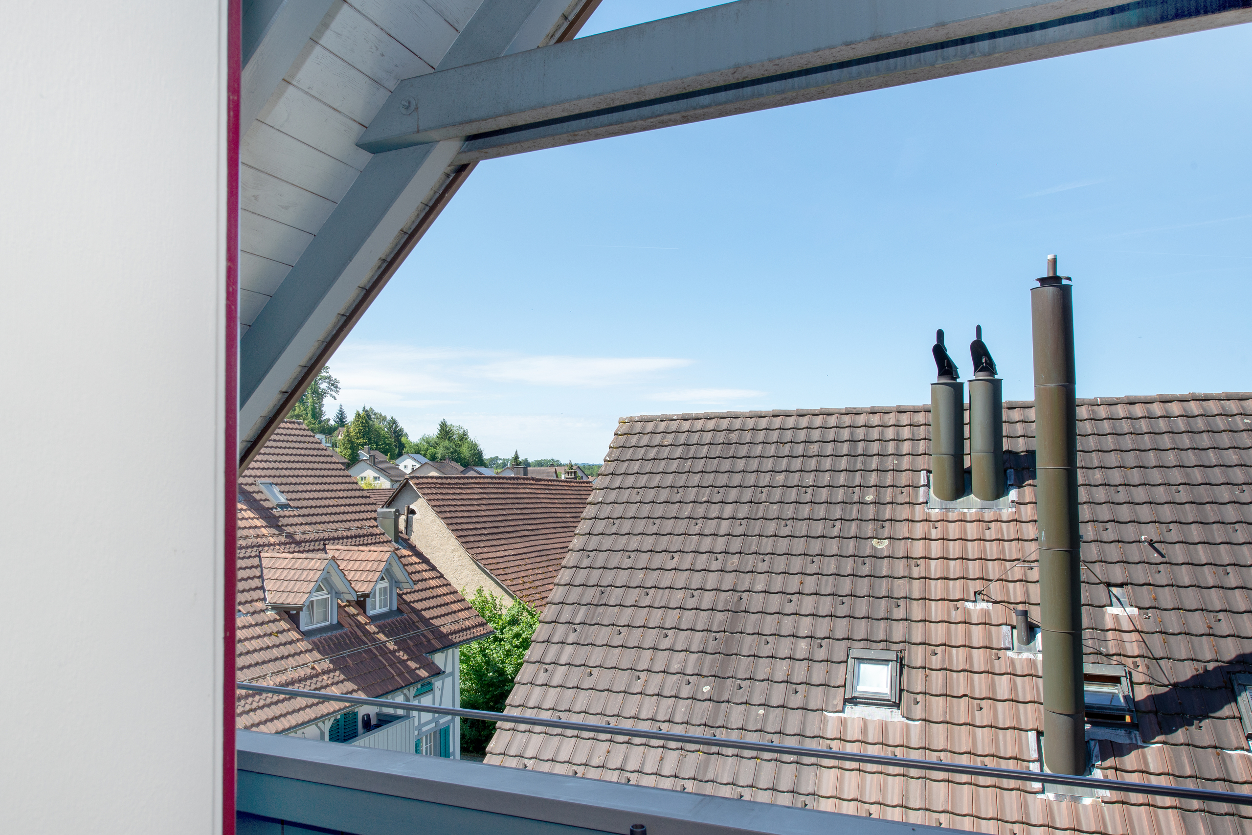 Blick vom Dachgeschossbalkon über die Dächer