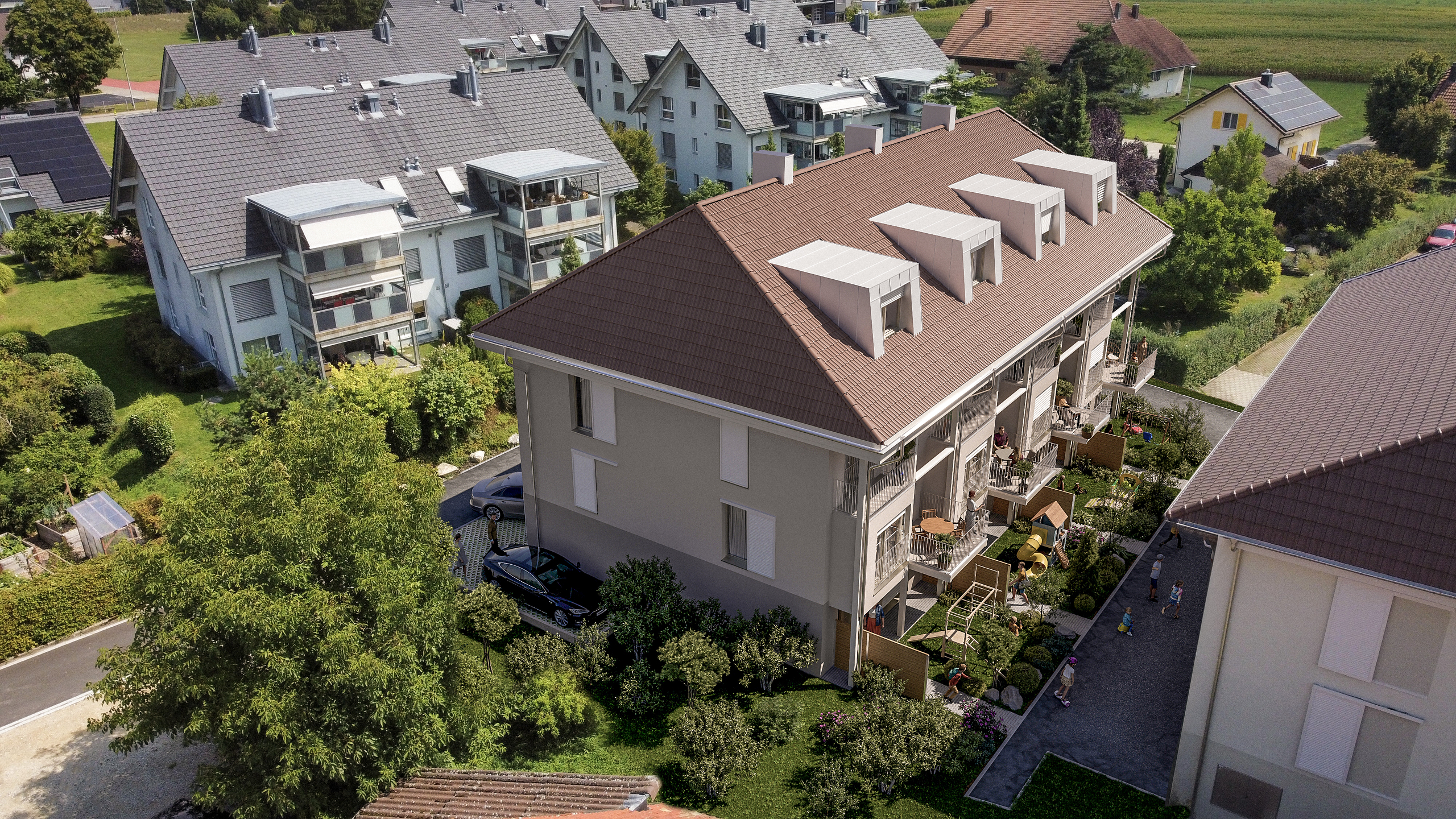 Luftaufnahme einer Wohnanlage mit mehreren Mehrfamilienhäusern