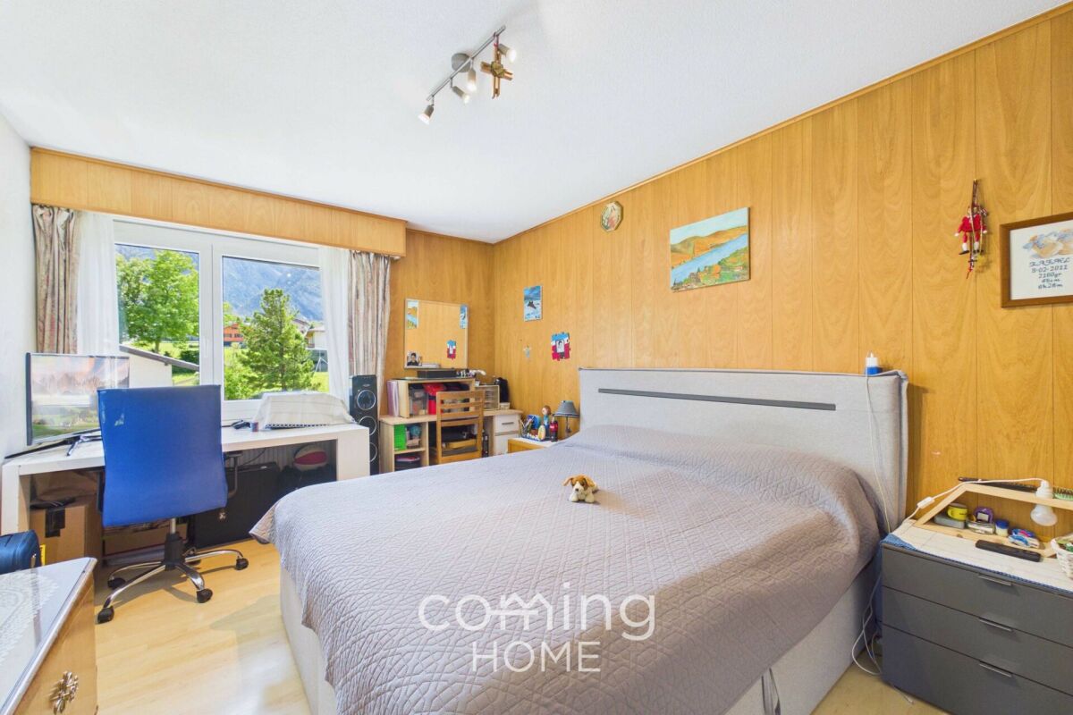 Schlafzimmer mit Arbeitsbereich
