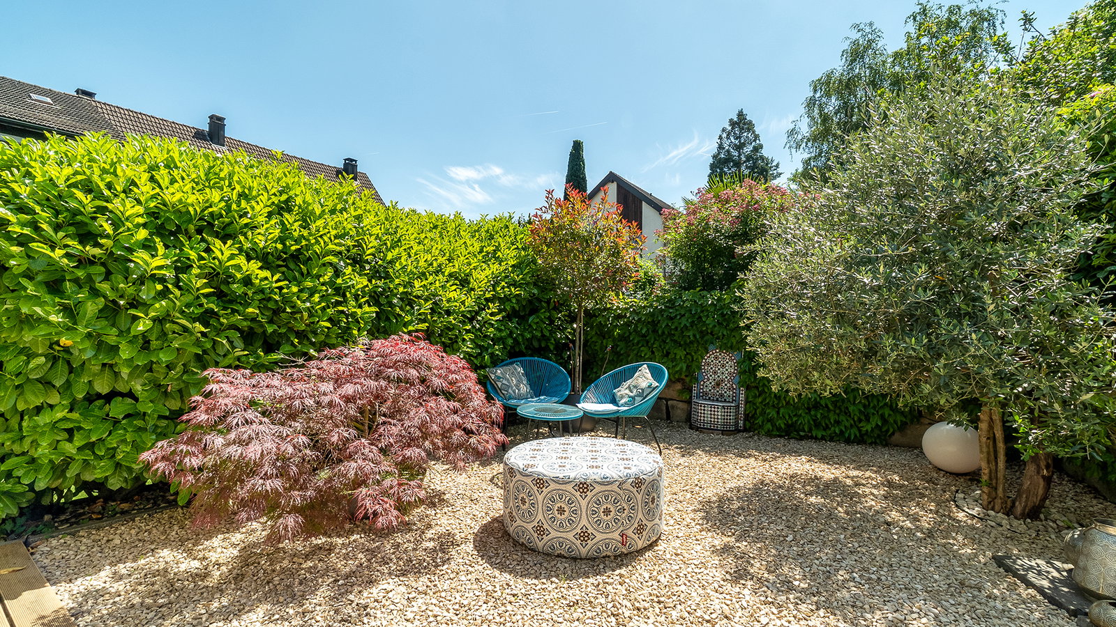 Mediterraner Garten mit Sitzbereich