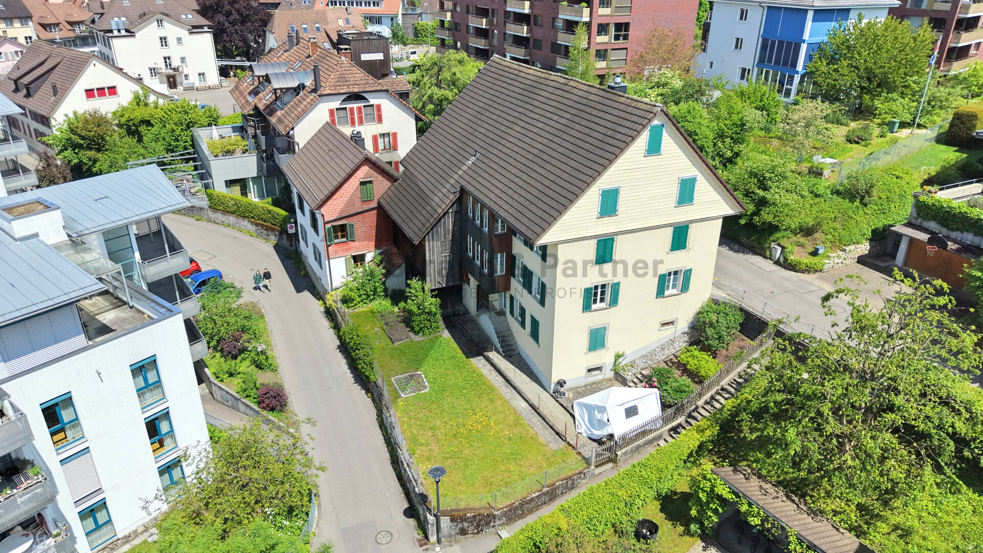 Luftaufnahme eines Wohnquartiers mit Einfamilienhäusern