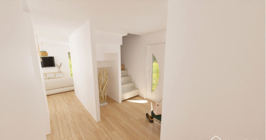 Heller Eingangsbereich mit Treppe und Sichtachse ins Wohnzimmer