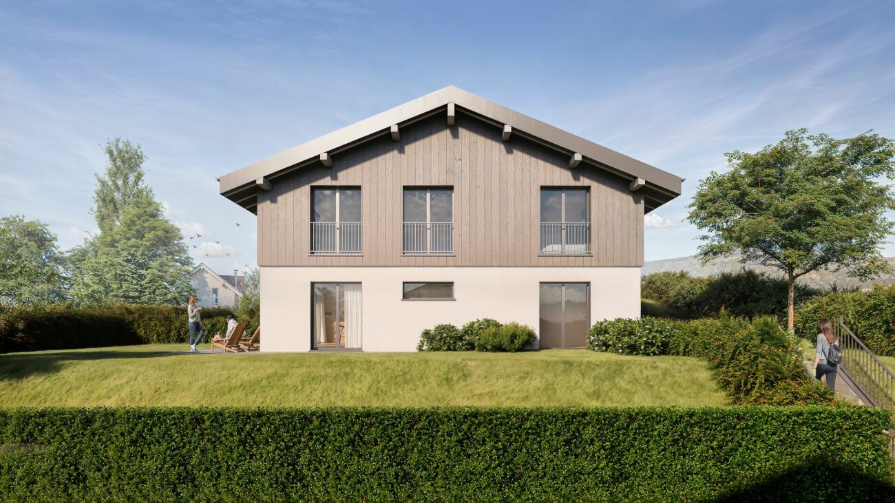 Modernes Einfamilienhaus mit Holzfassade und Garten