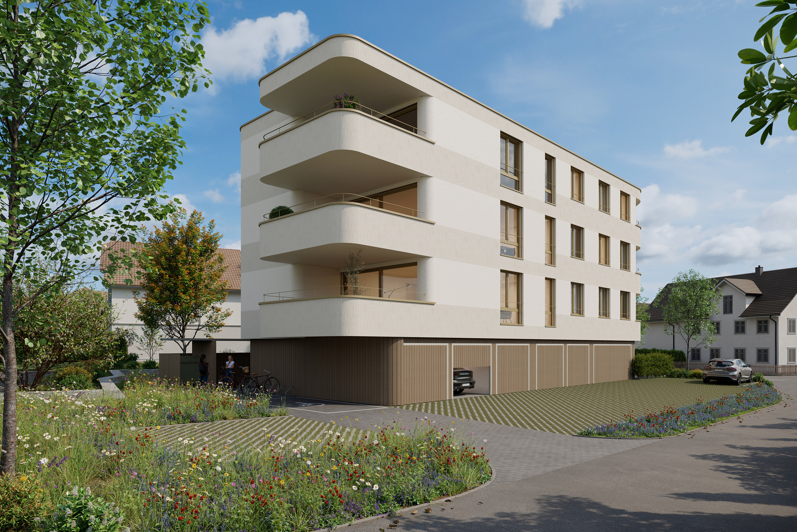 Modernes Mehrfamilienhaus mit Balkon und grüner Umgebung