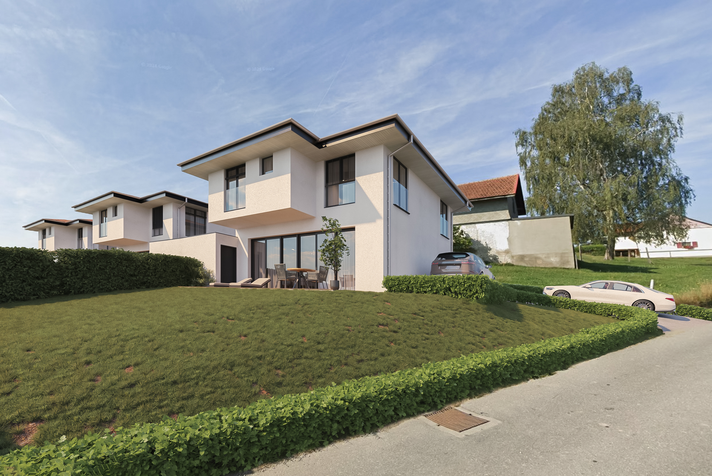 Moderne Wohnhäuser mit Garten und Zufahrt