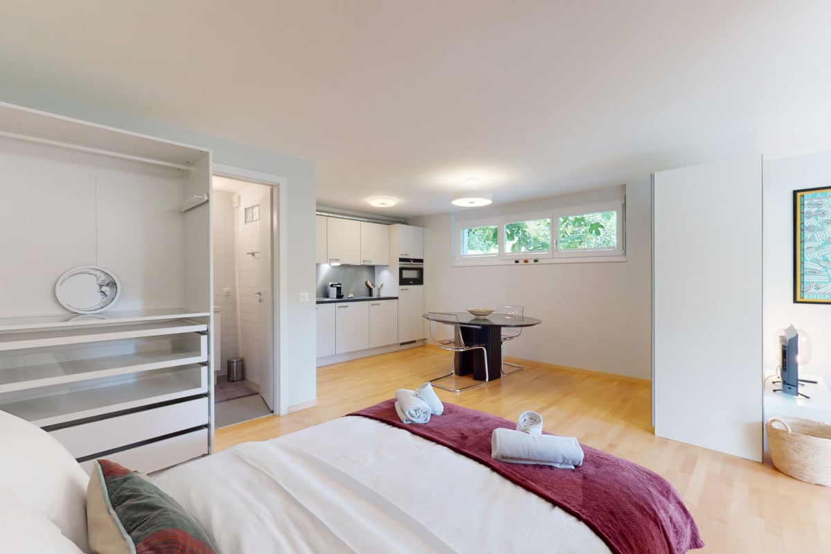 Schlafzimmer mit offener Küchenzeile