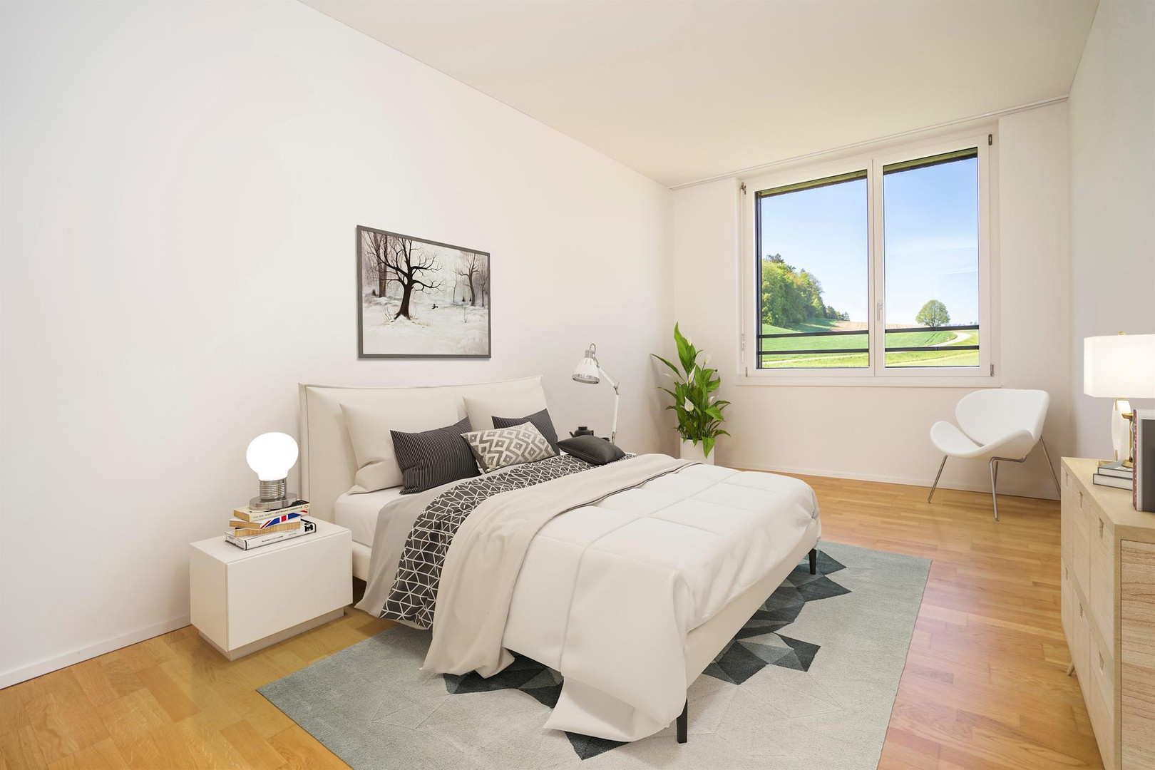 Helles Schlafzimmer mit Blick ins Grüne
