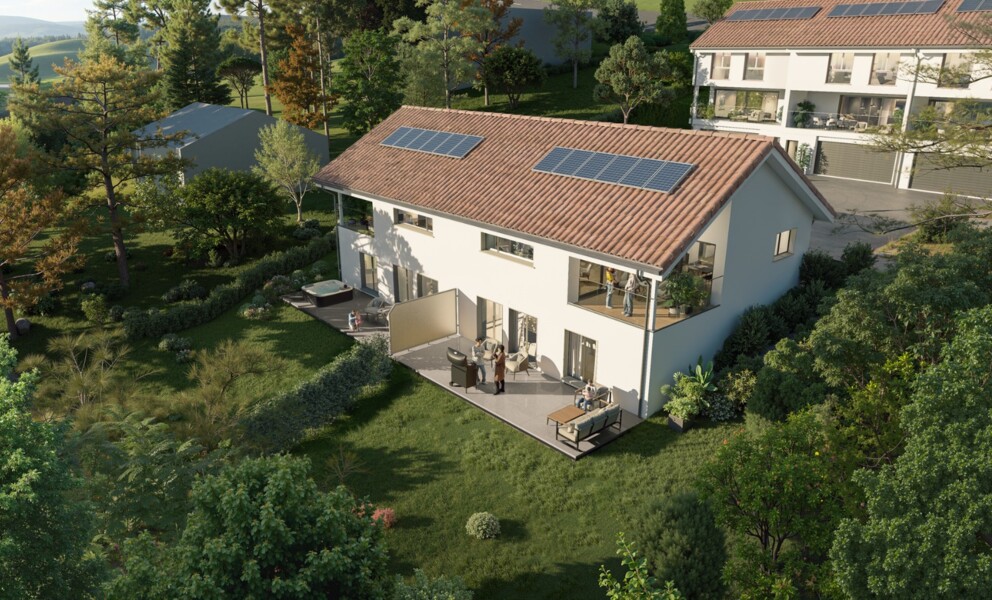 Luftaufnahme eines Einfamilienhauses mit Garten