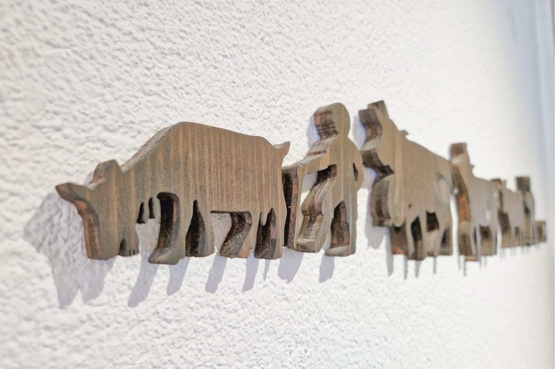 Dekorative Wandfigur aus Holz