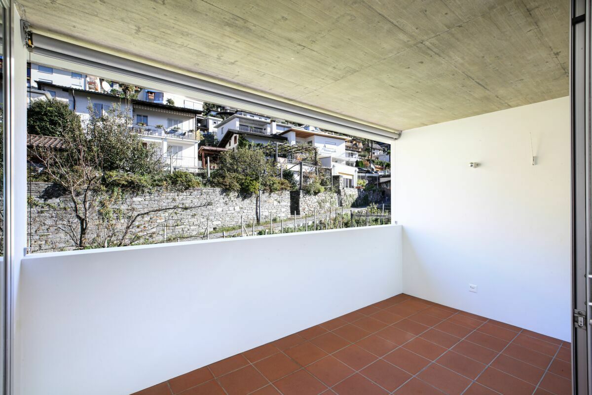 Überdachter Balkon mit Ausblick