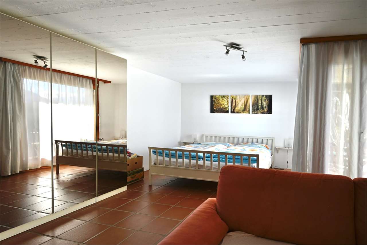 Schlafzimmer mit Terrakottaboden