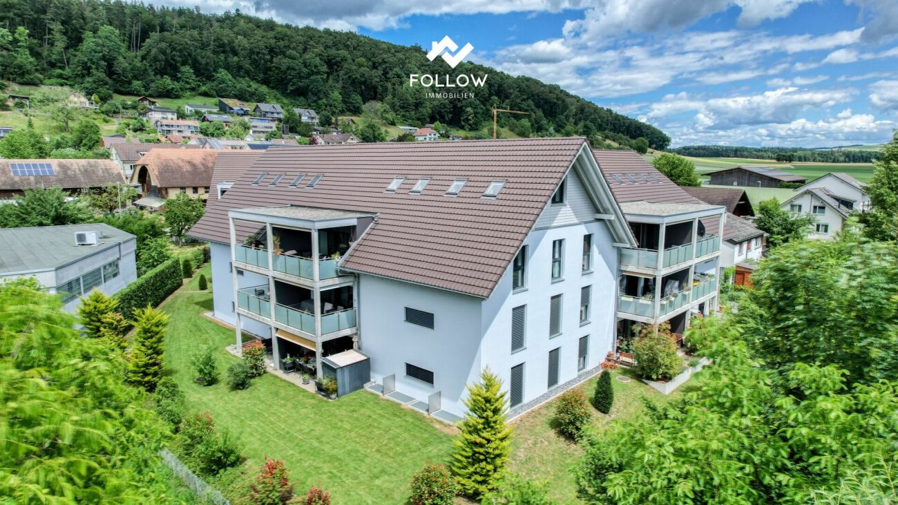 Mehrfamilienhaus in Hanglage mit Balkonen