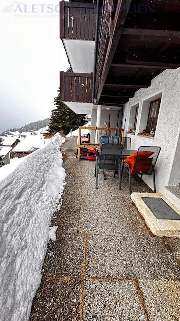 Balkon mit Schneeblick