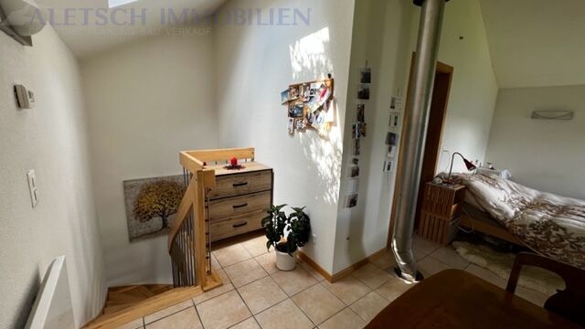 Treppenbereich mit angrenzendem Schlafzimmer