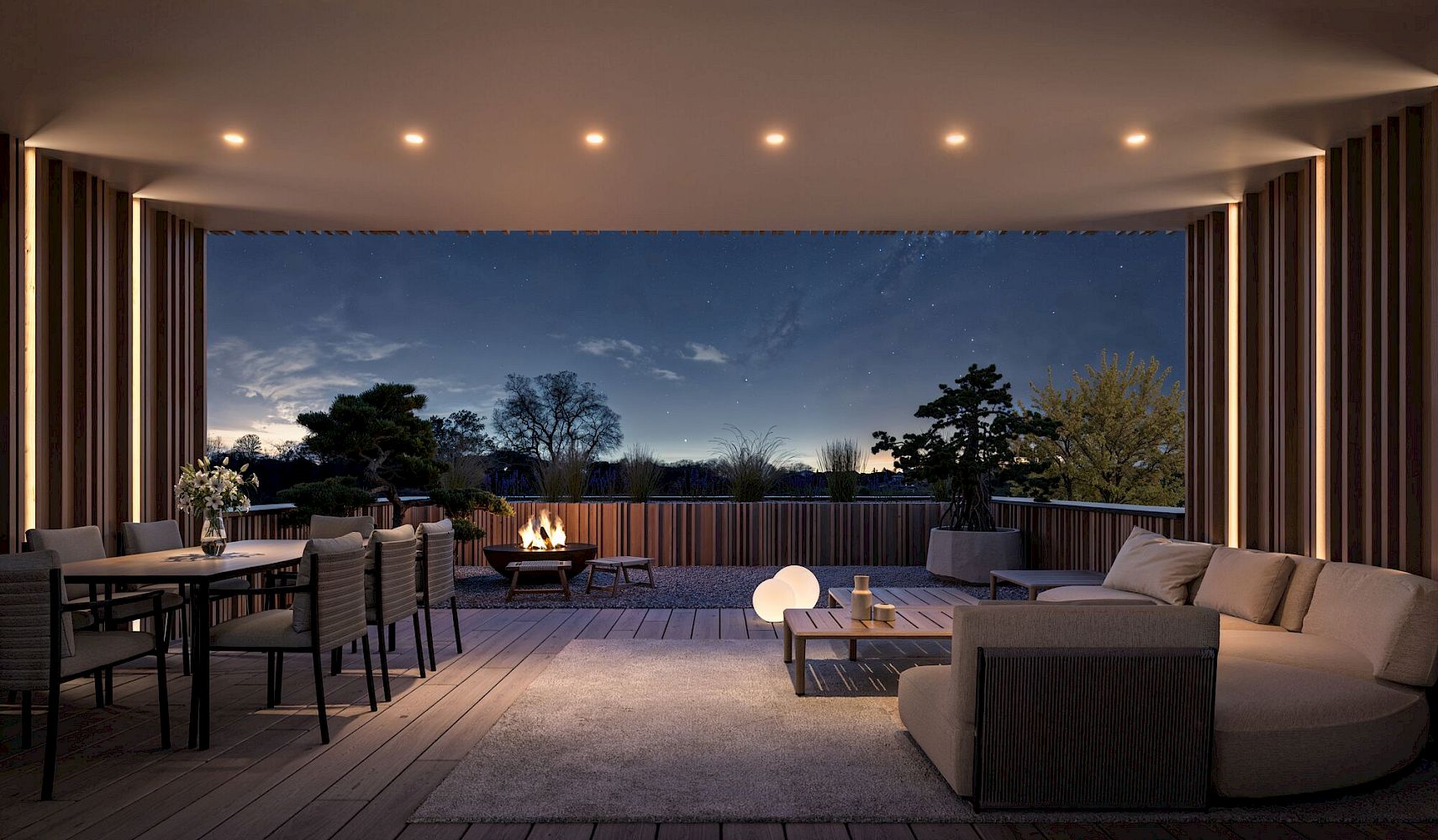 Dachterrasse mit Sitzgruppe bei Dämmerung
