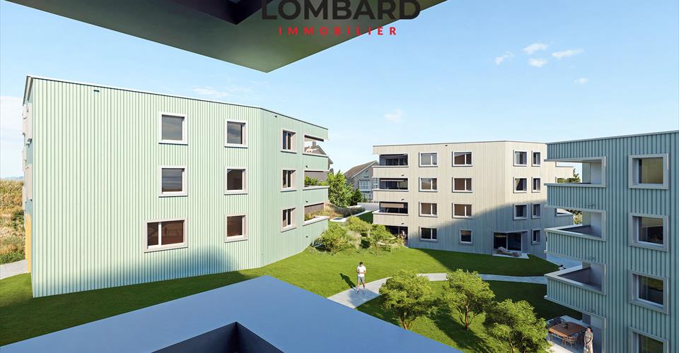 Außenansicht moderner Wohnanlage mit Innenhof