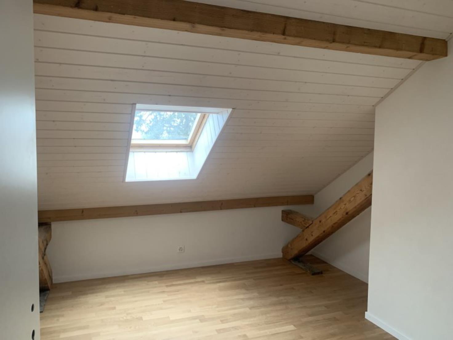 Ausgebauter Dachraum mit Dachfenster