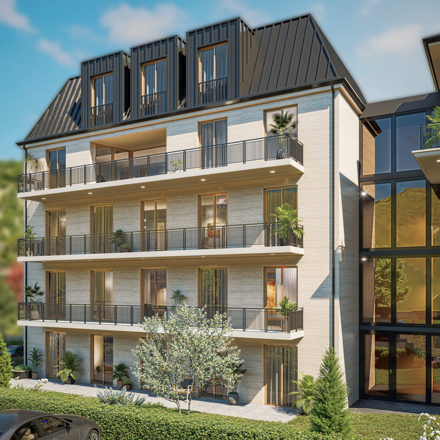 Modernes Mehrfamilienhaus mit Dachgeschossen und Balkonen