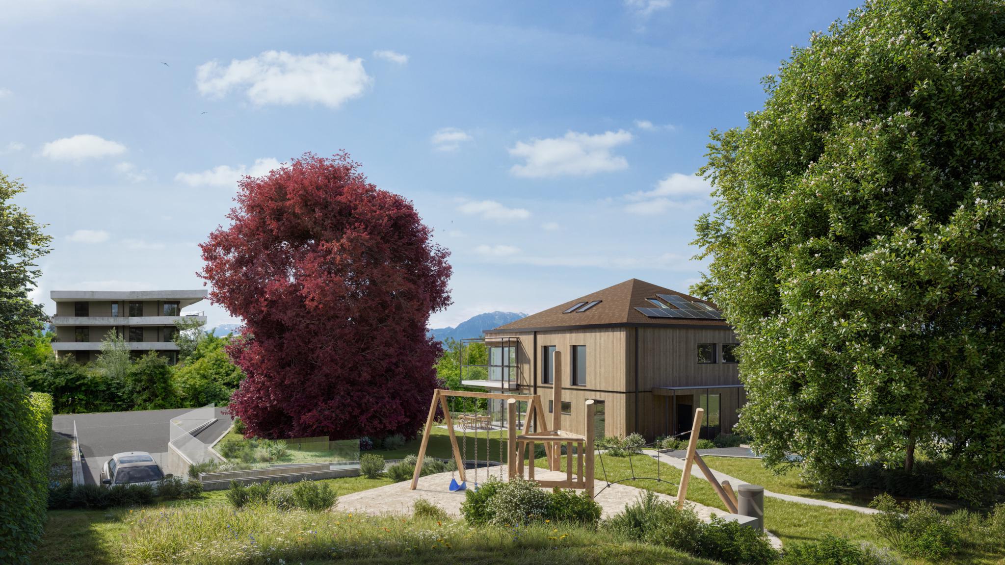 Außenansicht eines modernen Hauses mit Garten und Spielbereich