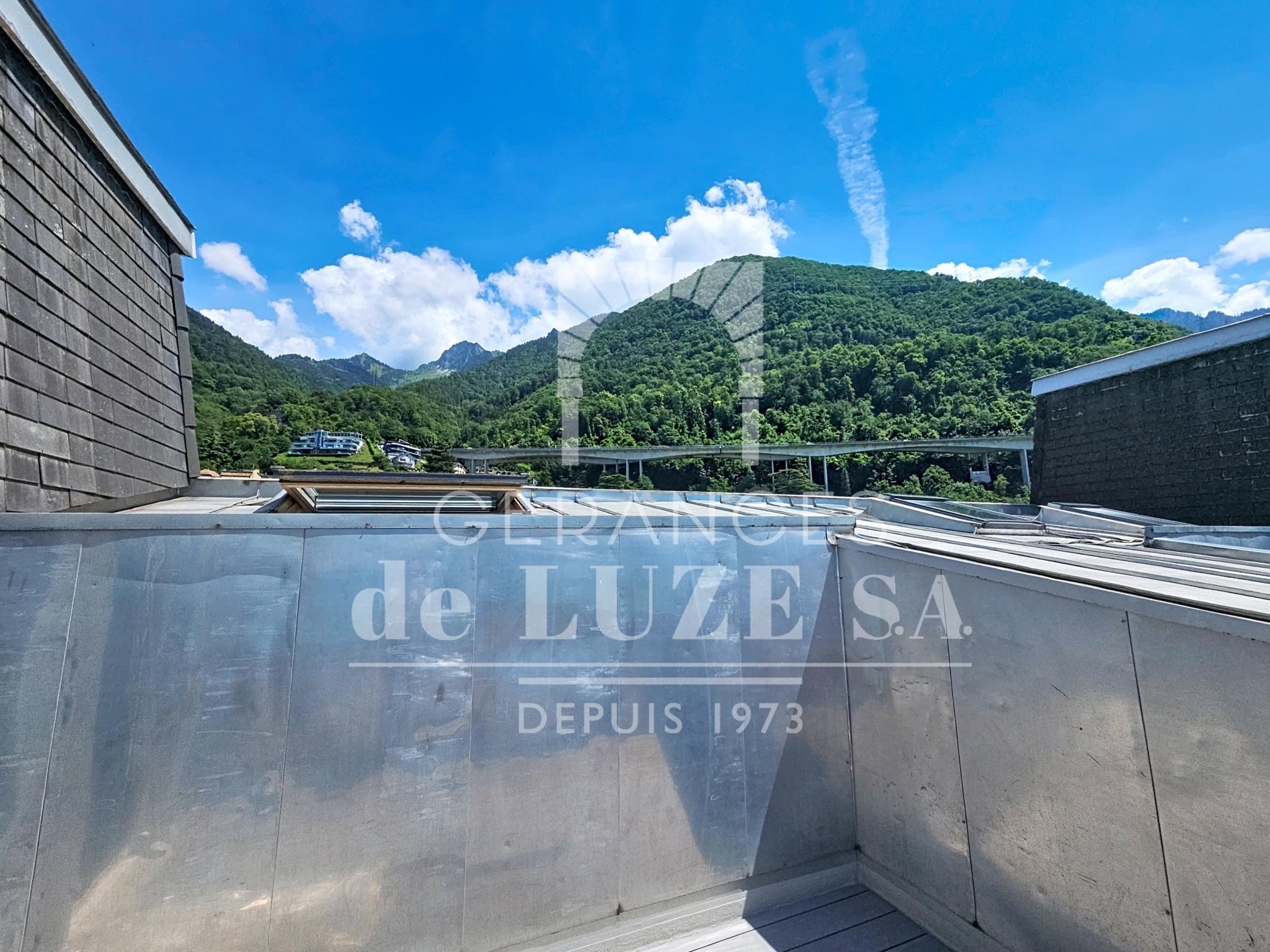 Dachterrasse mit Bergblick