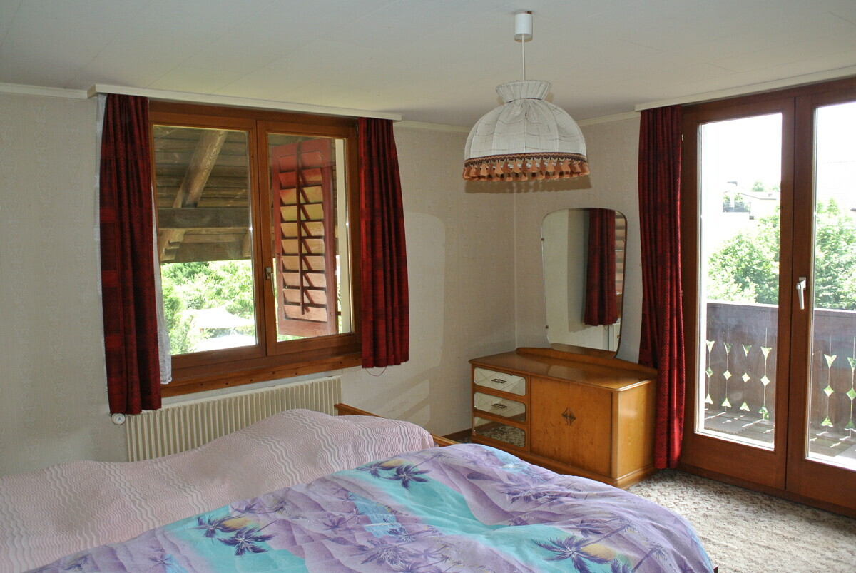 Schlafzimmer mit Balkonzugang