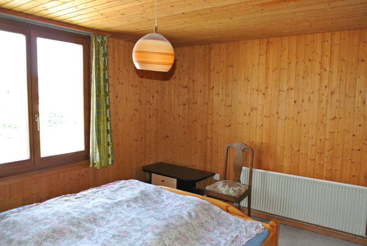 Holzvertäuschtes Schlafzimmer