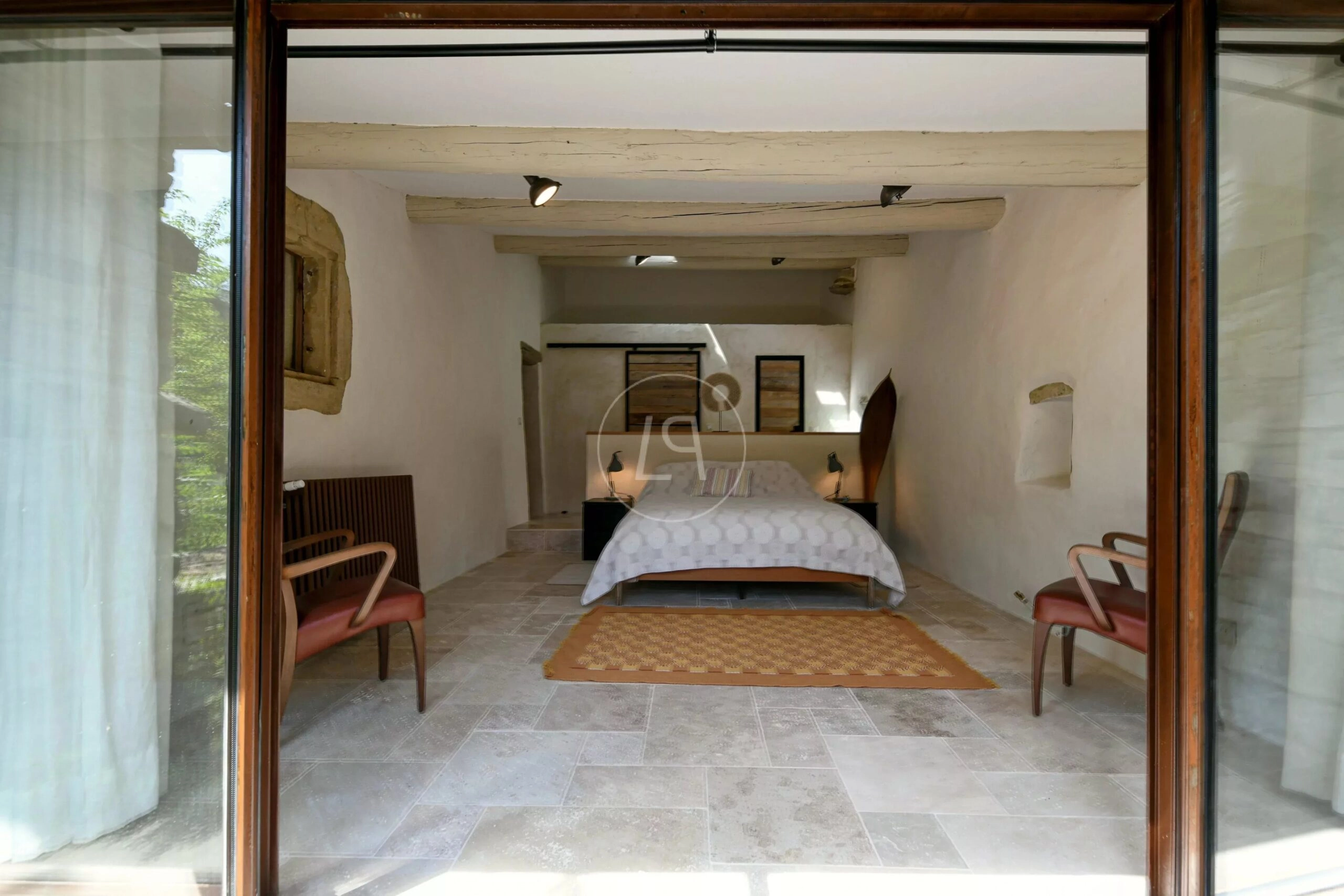 Schlafzimmer mit rustikalem Charakter
