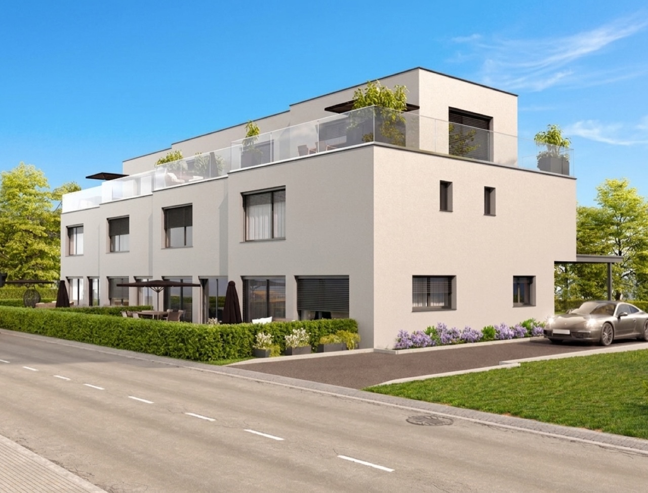 Modernes Mehrfamilienhaus mit Dachterrassen