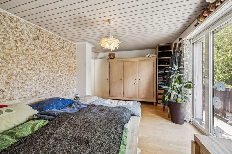 Schlafzimmer mit Balkonzugang