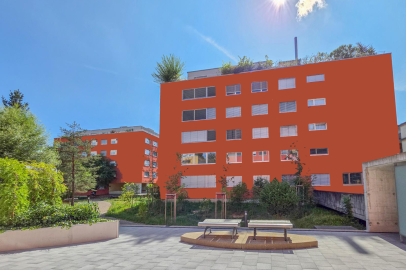 Wohnanlage mit orangefarbener Fassade