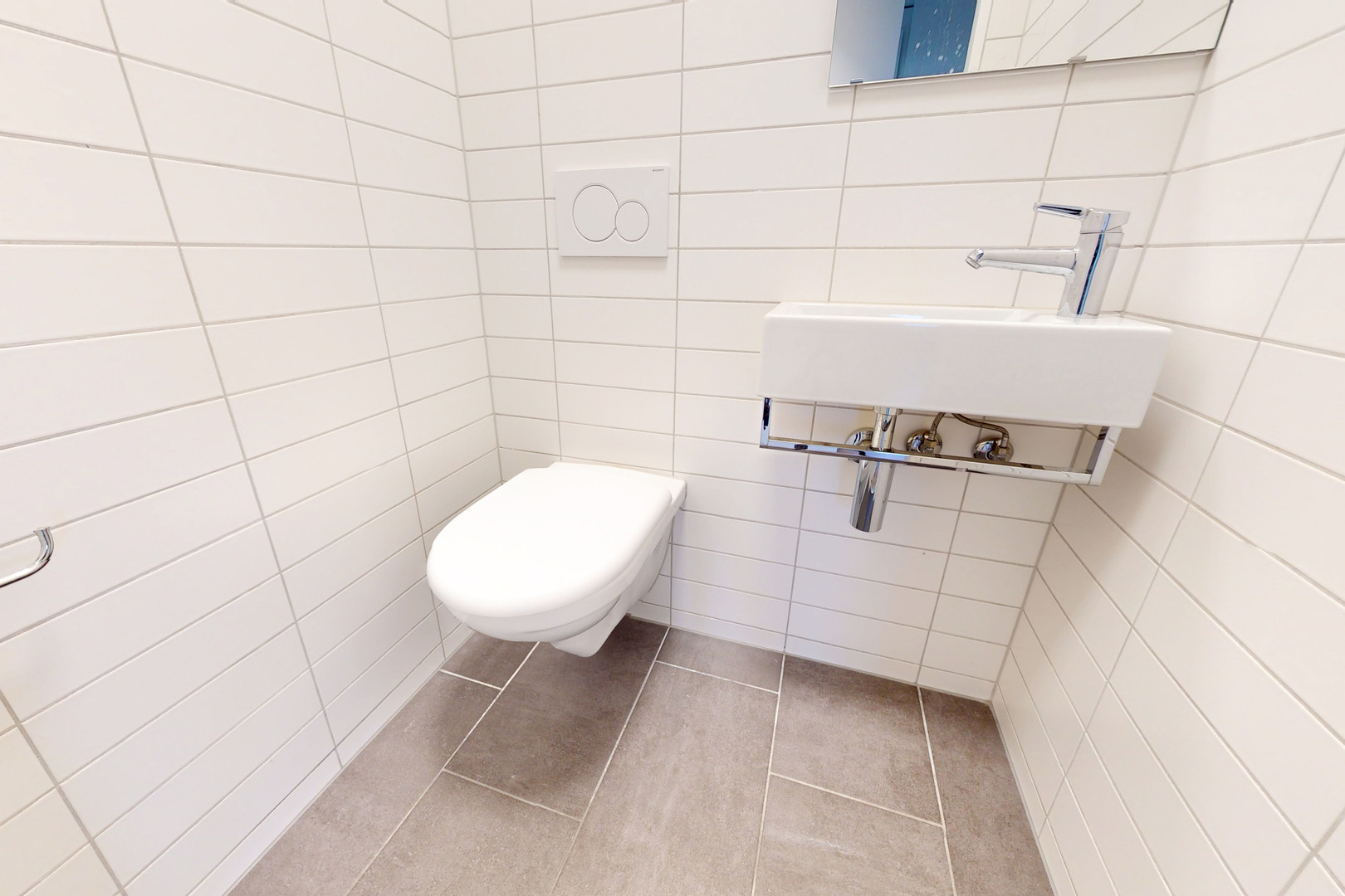 Modernes Gäste-WC mit Wand-WC