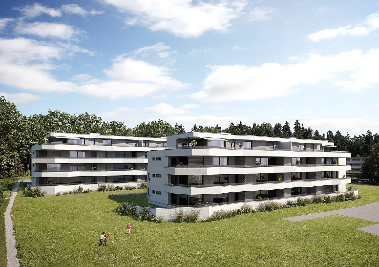 Moderne Wohnanlage mit großzügigen Grünflächen