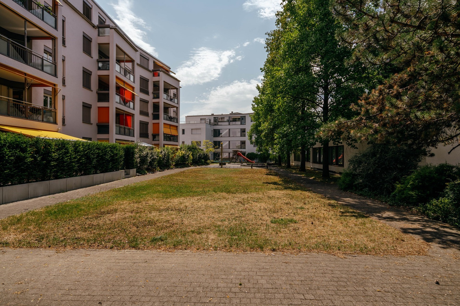 Wohnanlage mit Innenhof und Spielbereich