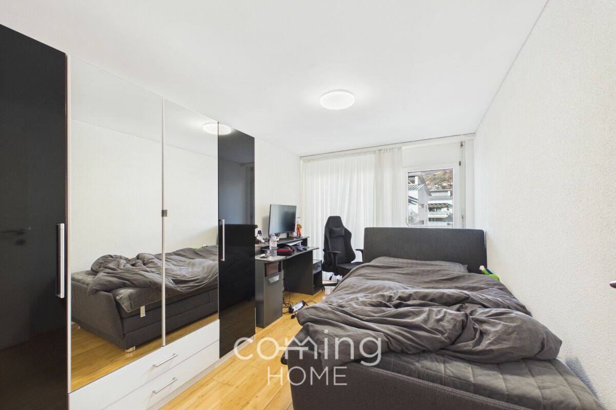 Schlafzimmer mit Arbeitsbereich