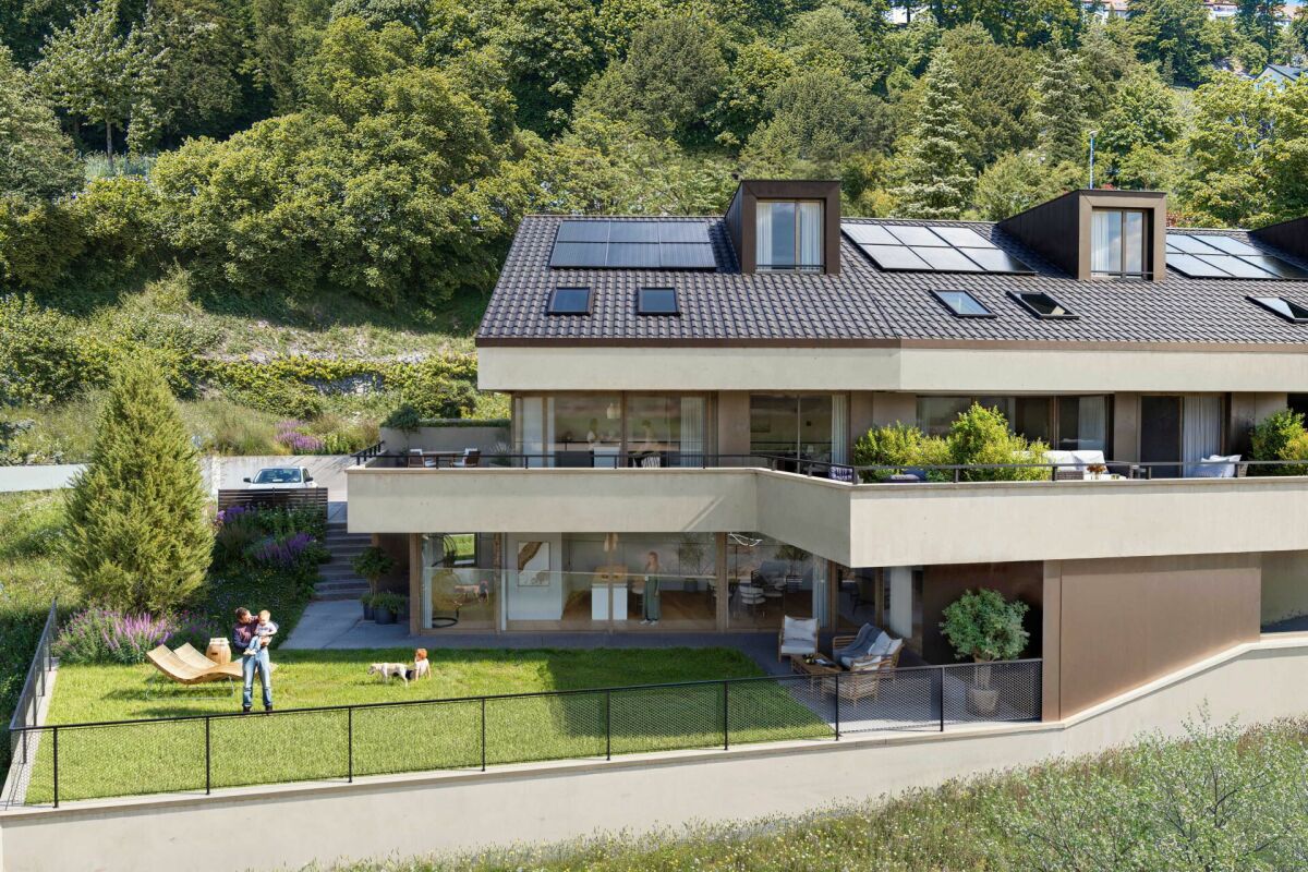Modernes Mehrfamilienhaus mit Garten und Terrassen